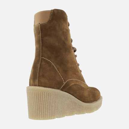 Lace-up booties in brown suede leather with high wedge