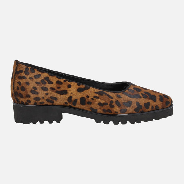 Ruka leather dancers in animal print leopard with track floor