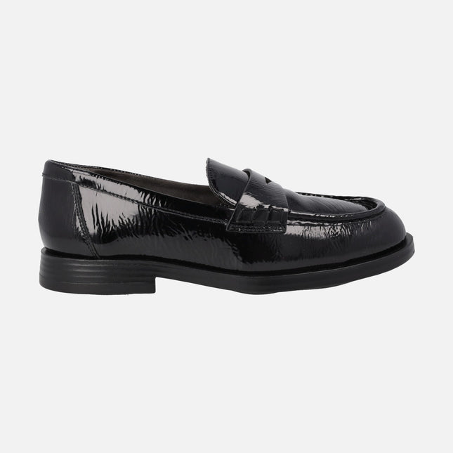 Black Patent moccasins with mask ornament