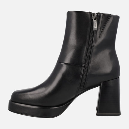 Black leather ankle boots with high heel and platform