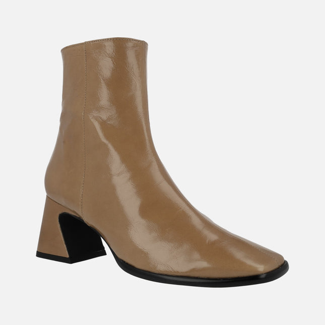 Leather ankle boots with brightness and half height heel