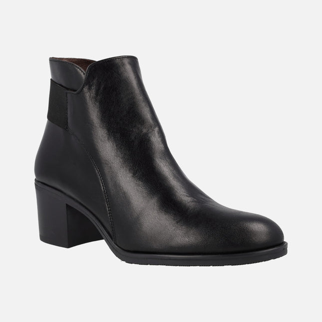 Black leather ankle boots with heel and back elastic