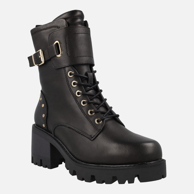 Black leather boots with laces and track outsole