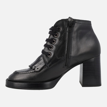 Black leather boots with laces and fringes