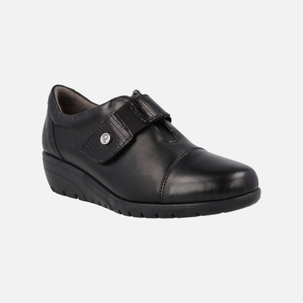 Black comfort shoes with velcro closure and rubber wedge