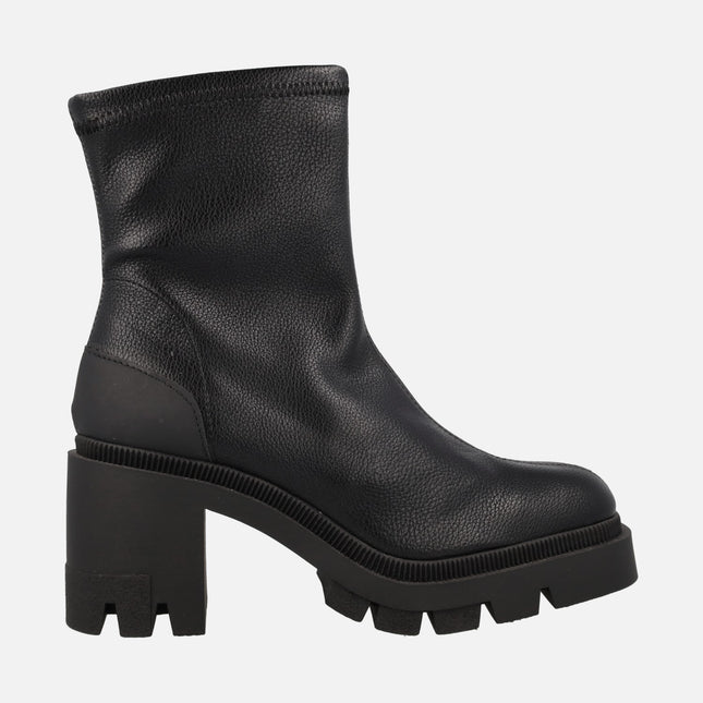 Black ankle boots made of elastic leather texture fabric with track sole