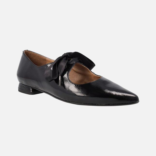 Black patent leather shoes with black satin laces