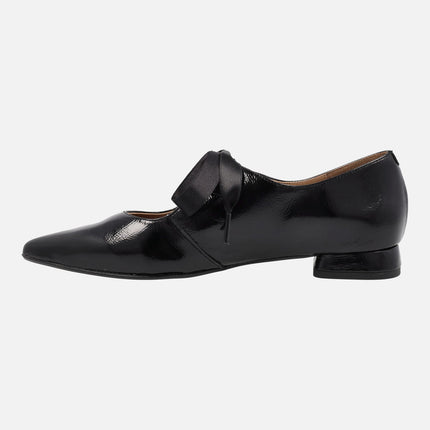 Black patent leather shoes with black satin laces