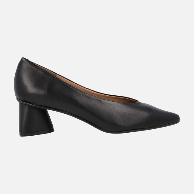 Black leather pumps with geometric heel