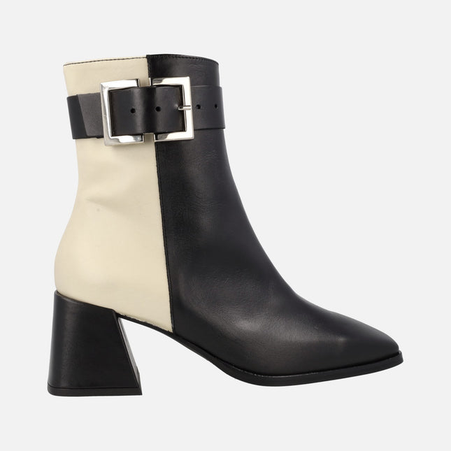 Bicolor leather ankle boots in Black and Beige with buckle ornament