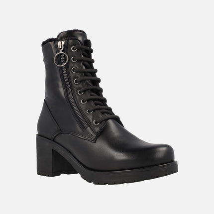 Black leather heeled boots with zip
