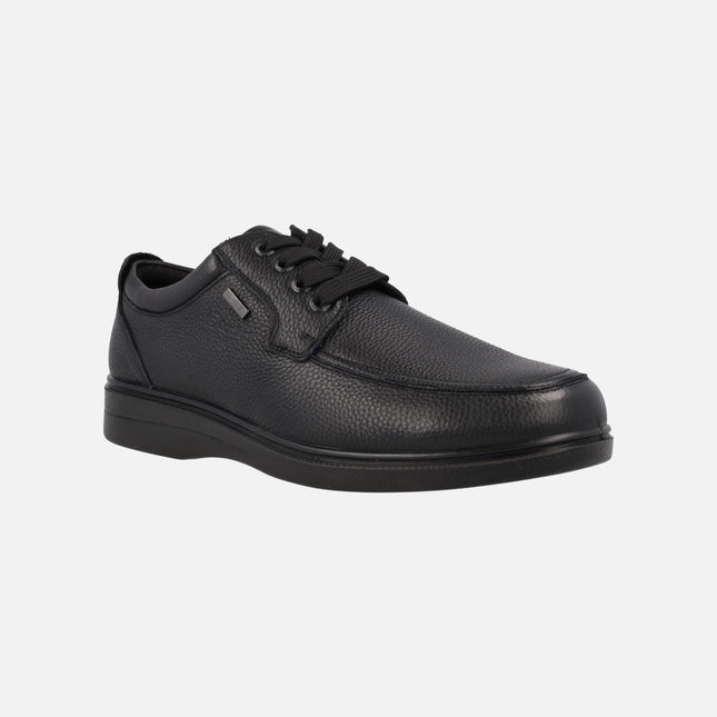 Black leather shoes with laces and text membrane