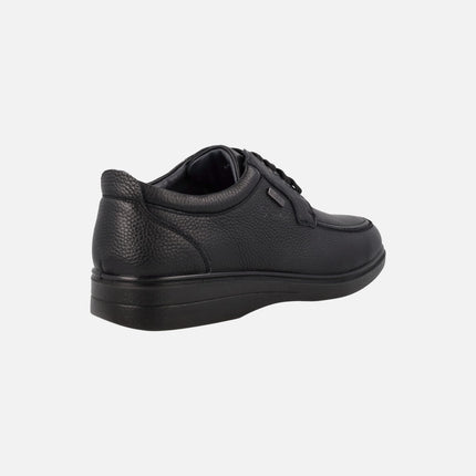 Black leather shoes with laces and text membrane