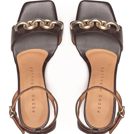Leather sandals with metallic ornament and ankle bracelet