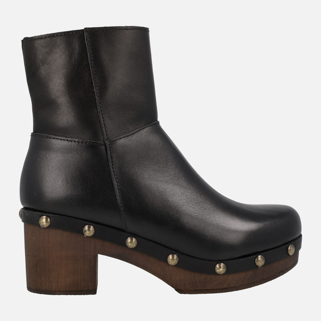 Leather ankle boots with wooden outsole and studs