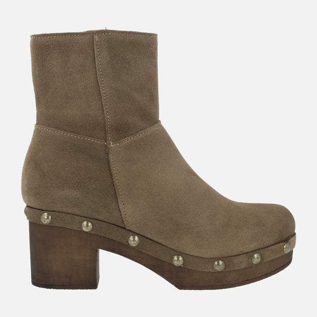 Leather ankle boots with wooden outsole and studs