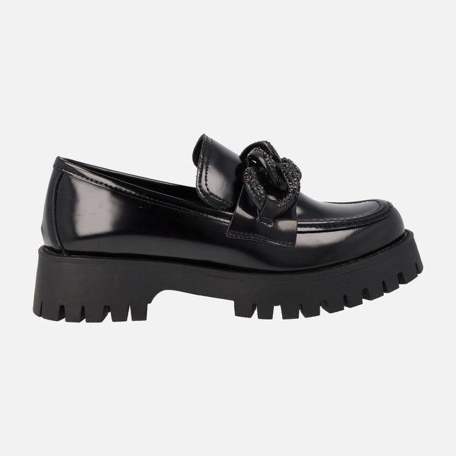 Black loafers with track sole and chain decoration