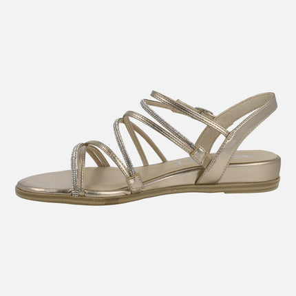 Metallic sandals with low wedge and straps of strass