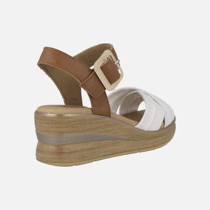 Wedged sandals in white and camel leather combination with buckle