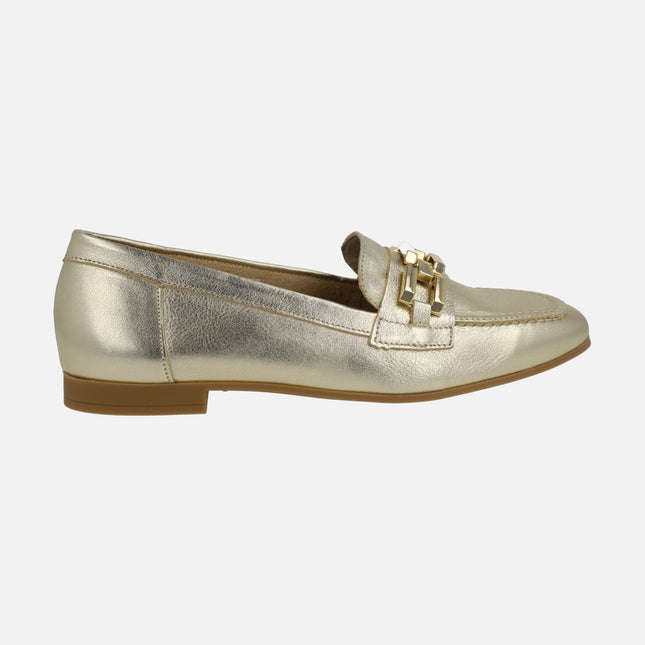 Flat moccasins in gold metallic leather with metallic ornament