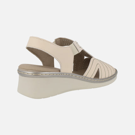 Women's comfort sandals in beige leather with side elastics