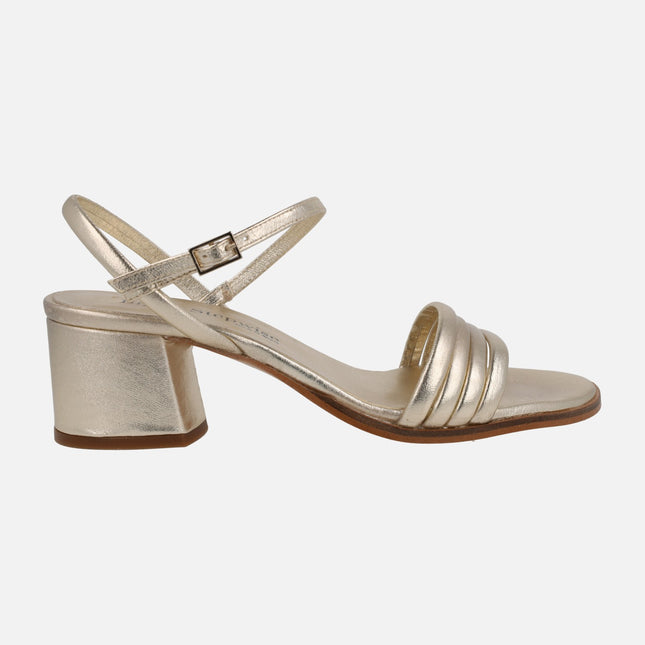 Gold leather heeled sandals with front strips and bracelet to the instep
