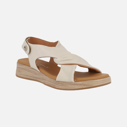 Low leather sandals with velcro closure and knot 