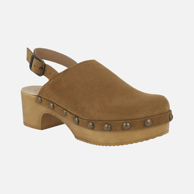 Suede clogs with buckled strip and studs