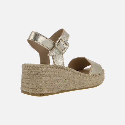 Leather espadrilles with buckle closure and natural fiber wedge