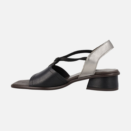 Black leather sandals with silver heel and elastics