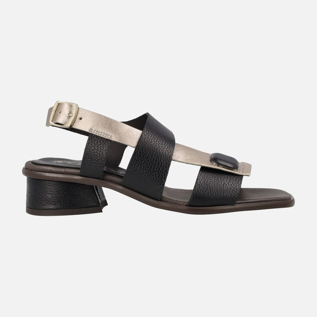 Black leather sandals with platinum strip and buckle closure