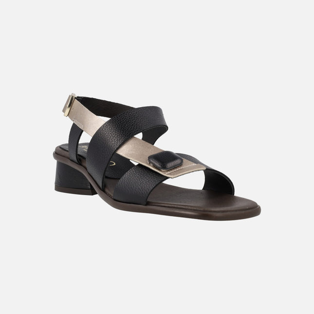 Black leather sandals with platinum strip and buckle closure
