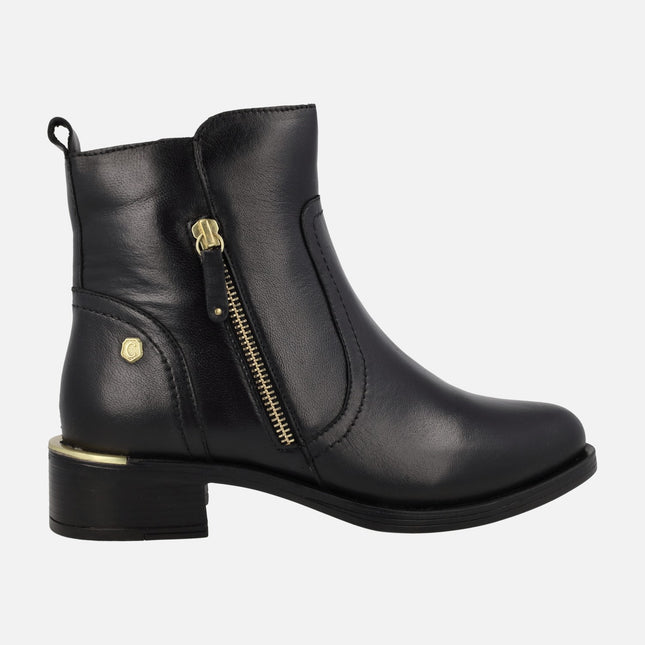 Black leather ankle boots with golden details