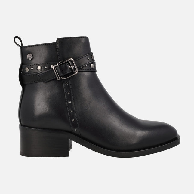 Black leather ankle boots with studs and double strip with buckle