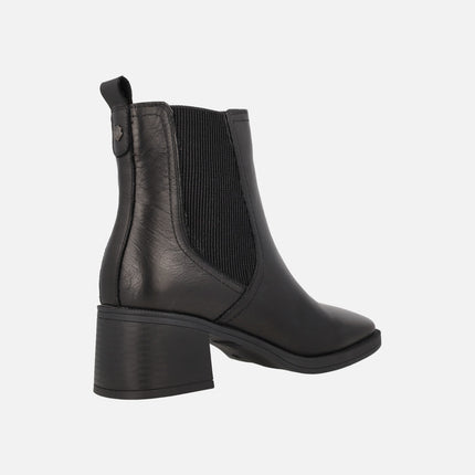 Black leather ankle boots with middle heel and elastic