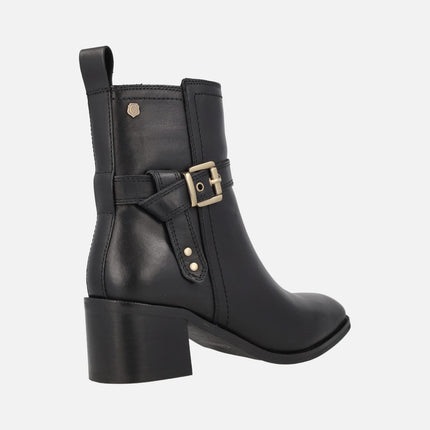 Black leather ankle boots with buckle and middle heel 