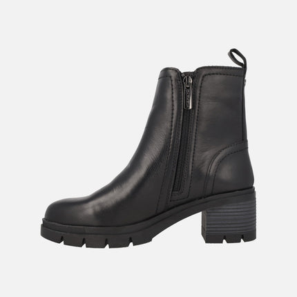 Black leather boots with heel and double zipper