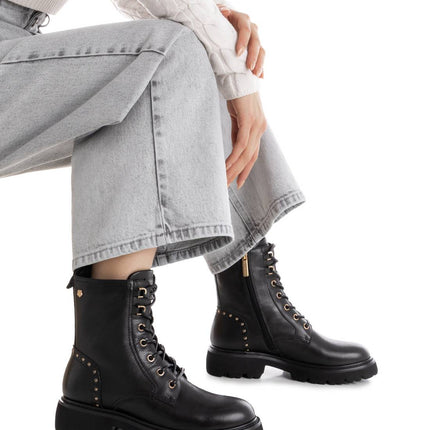 Black leather boots with laces and zipper