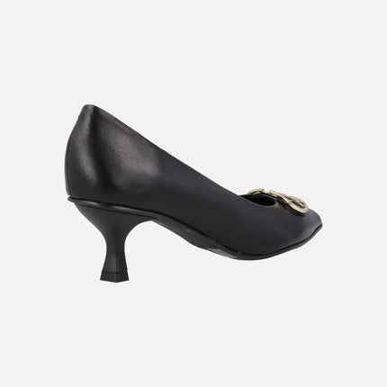 Black leather pumps with metallic ornament