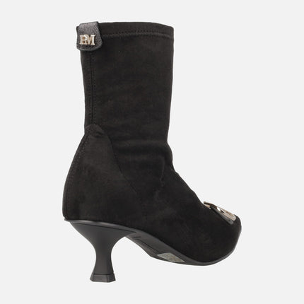 Black sock ankle boots in elastic fabric suede effect with metallic ornament