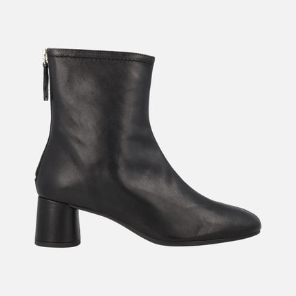 Doha Medium heeled booties on black leather