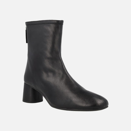 Doha Medium heeled booties on black leather