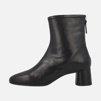 Doha Medium heeled booties on black leather