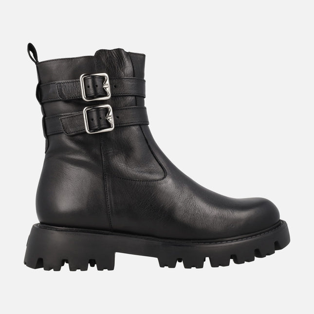 Black leather ankle boots with buckles and track sole