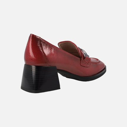 Patent leather loafers with metallic ornament