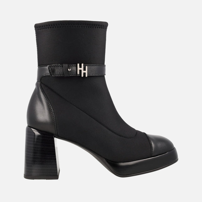 Heel and platform ankle boots in elastic fabric