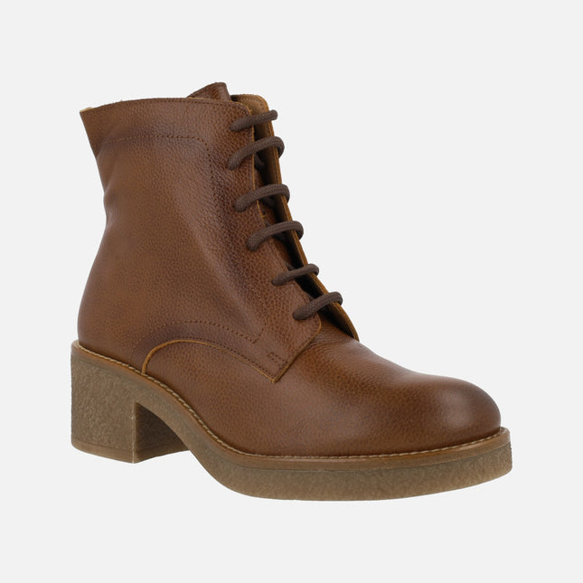 Brown leather boots with laces and zipper