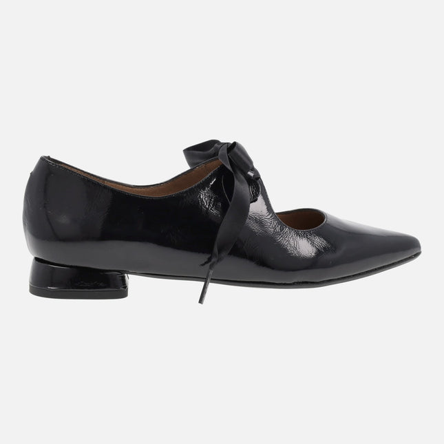 Black patent leather shoes with satin laces