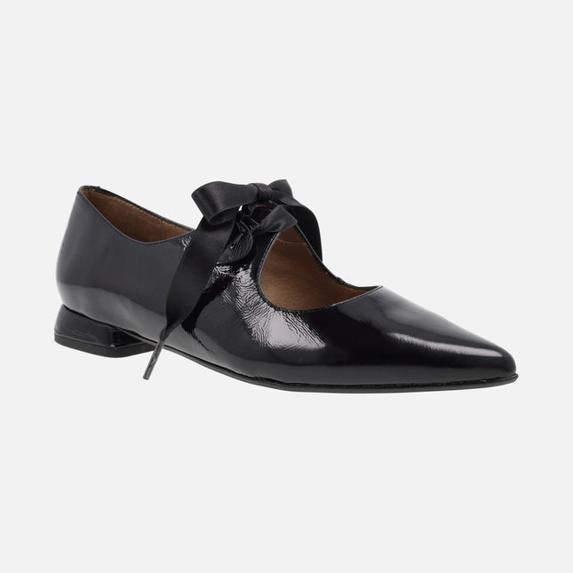 Black patent leather shoes with satin laces