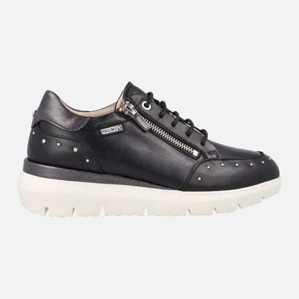 Black leather sneakers with studs and zip